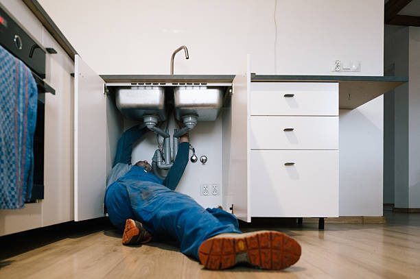 Professional Drain Cleaning technician working in Medina, WA